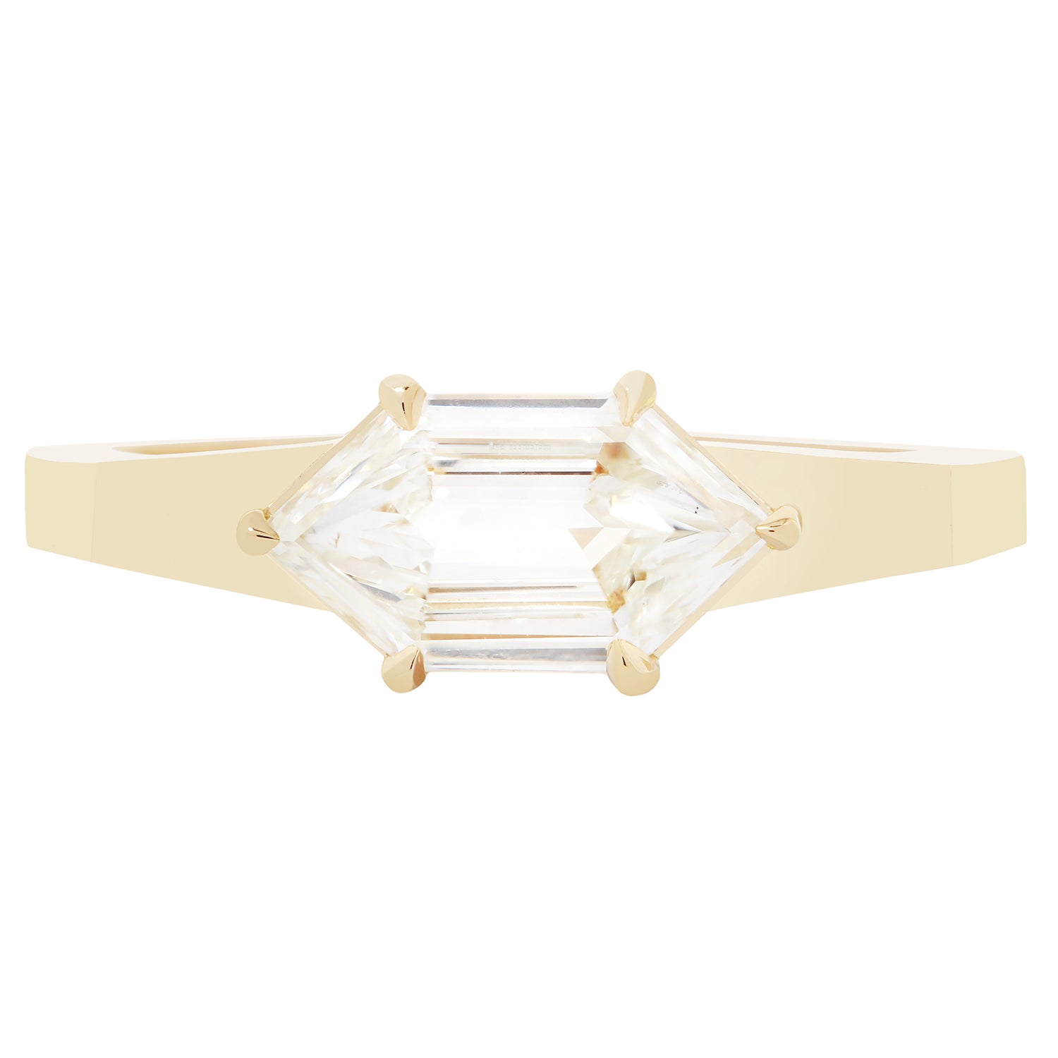 Gold ring with two large diamond stones on a white background