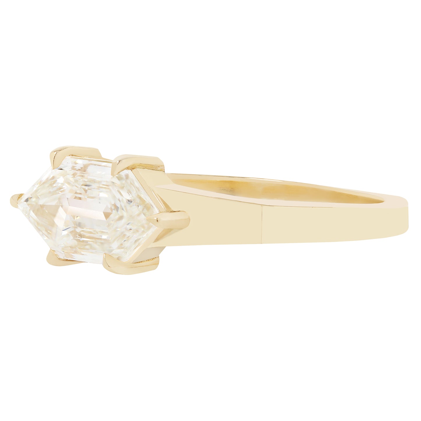 Gold ring with a diamond on a white background