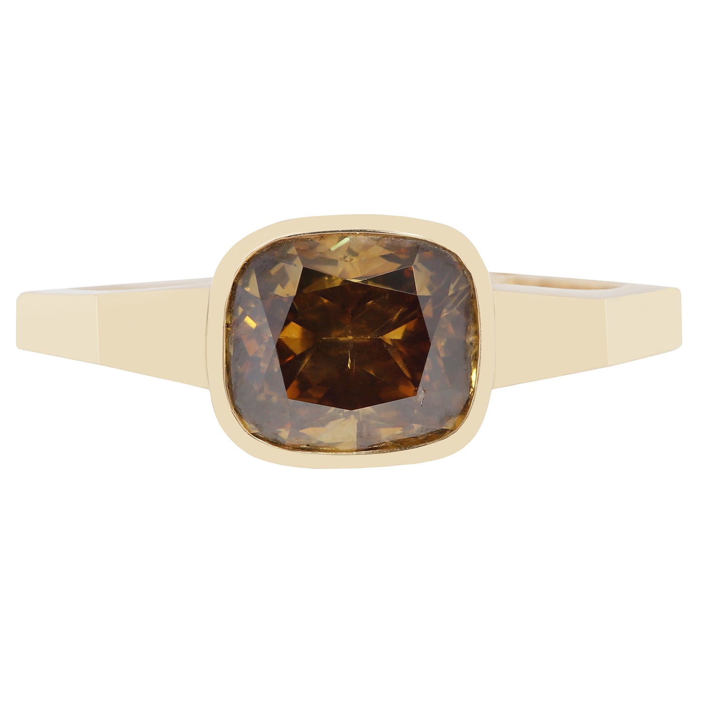 Gold ring with a brown diamond on a white background