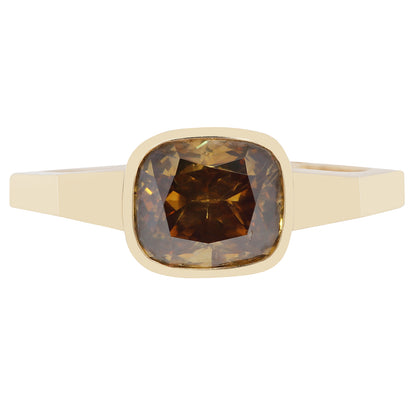 Gold ring with a brown diamond on a white background