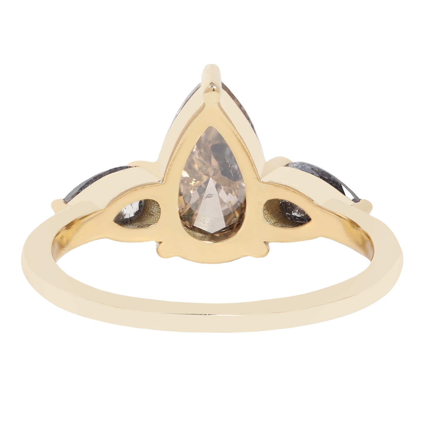 A gold ring featuring a large pear-cut clear diamond with inclusions, accented by two smaller marquise-cut gray diamonds on either side, shown on a plain white background.