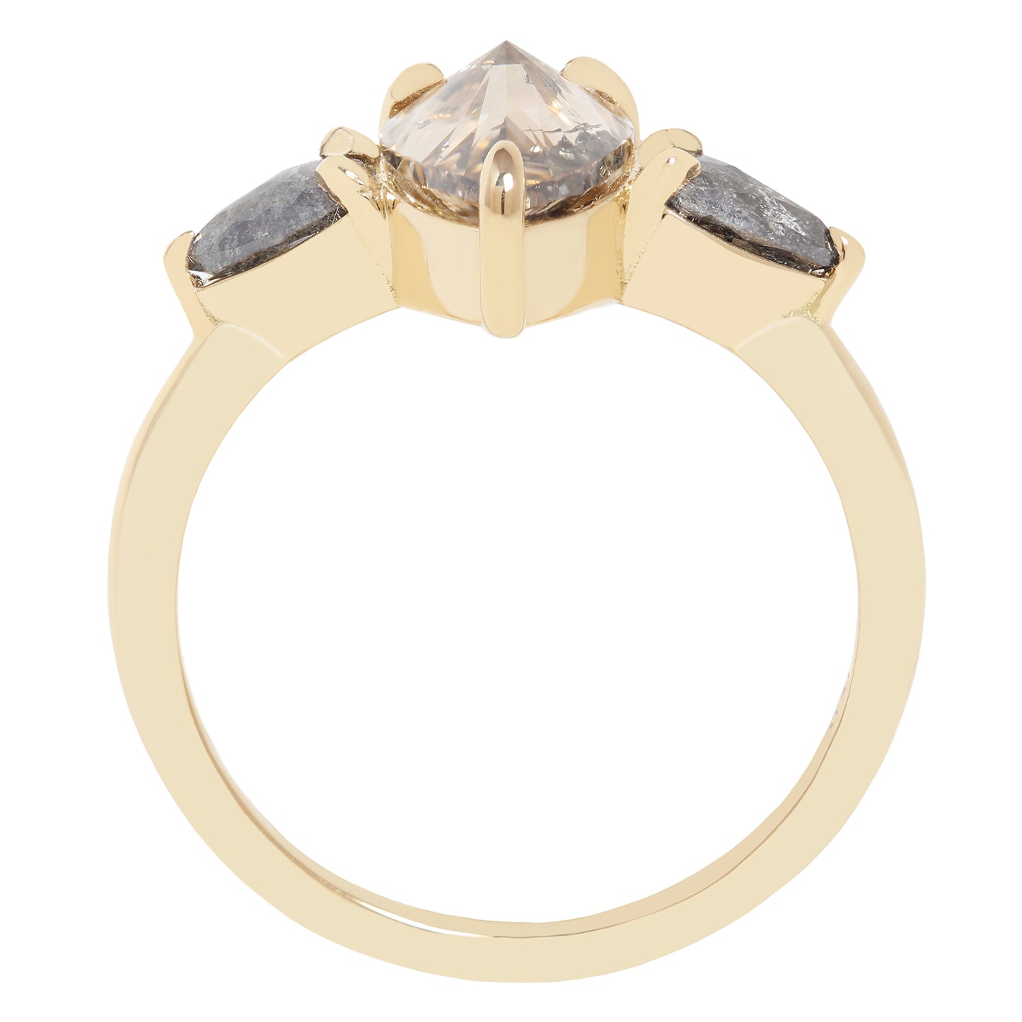 A gold ring featuring a large pear-cut clear diamond with inclusions, accented by two smaller marquise-cut gray diamonds on either side, shown on a plain white background.