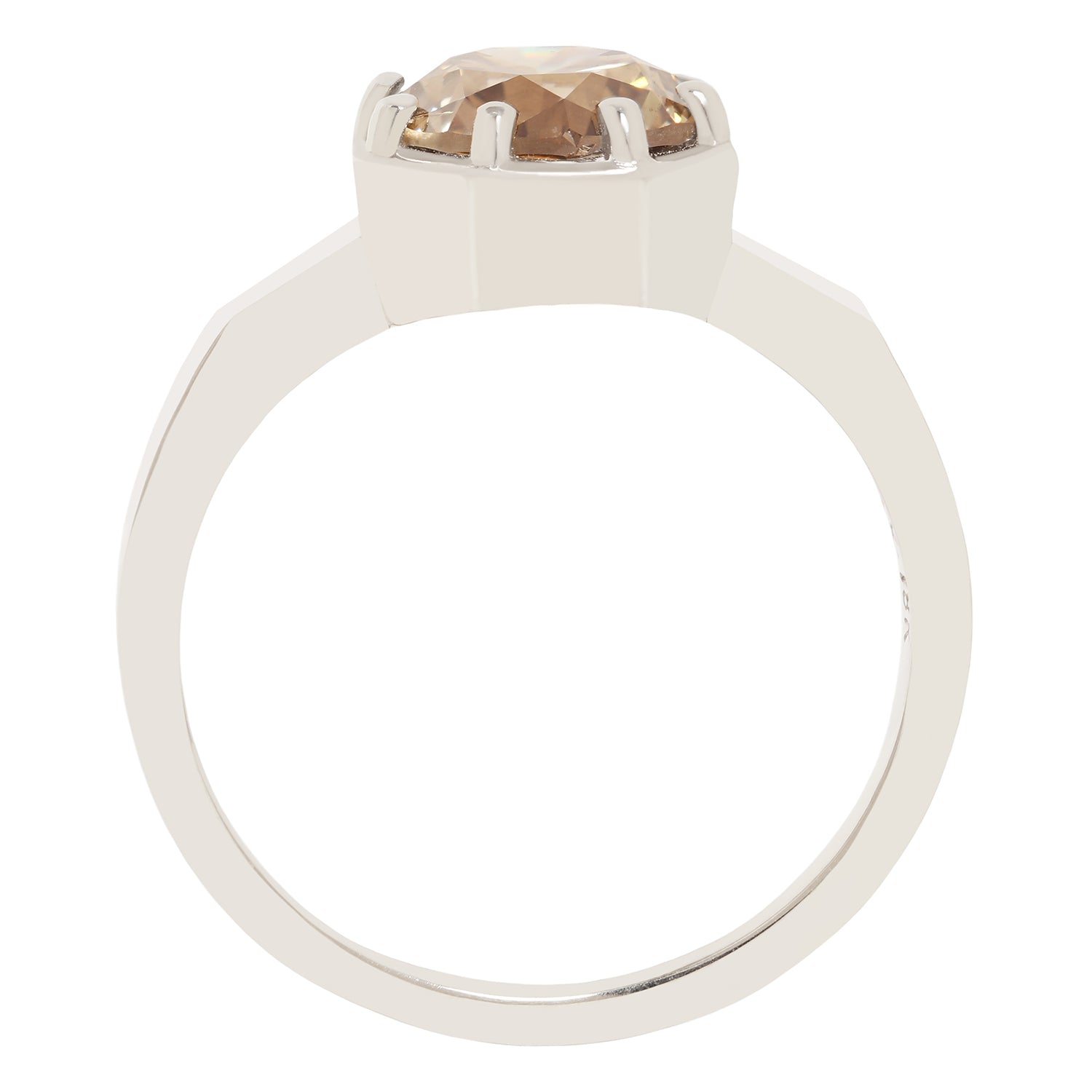 A white gold ring with a large, round, faceted champagne-colored gemstone in a prong setting, shown against a plain white background.