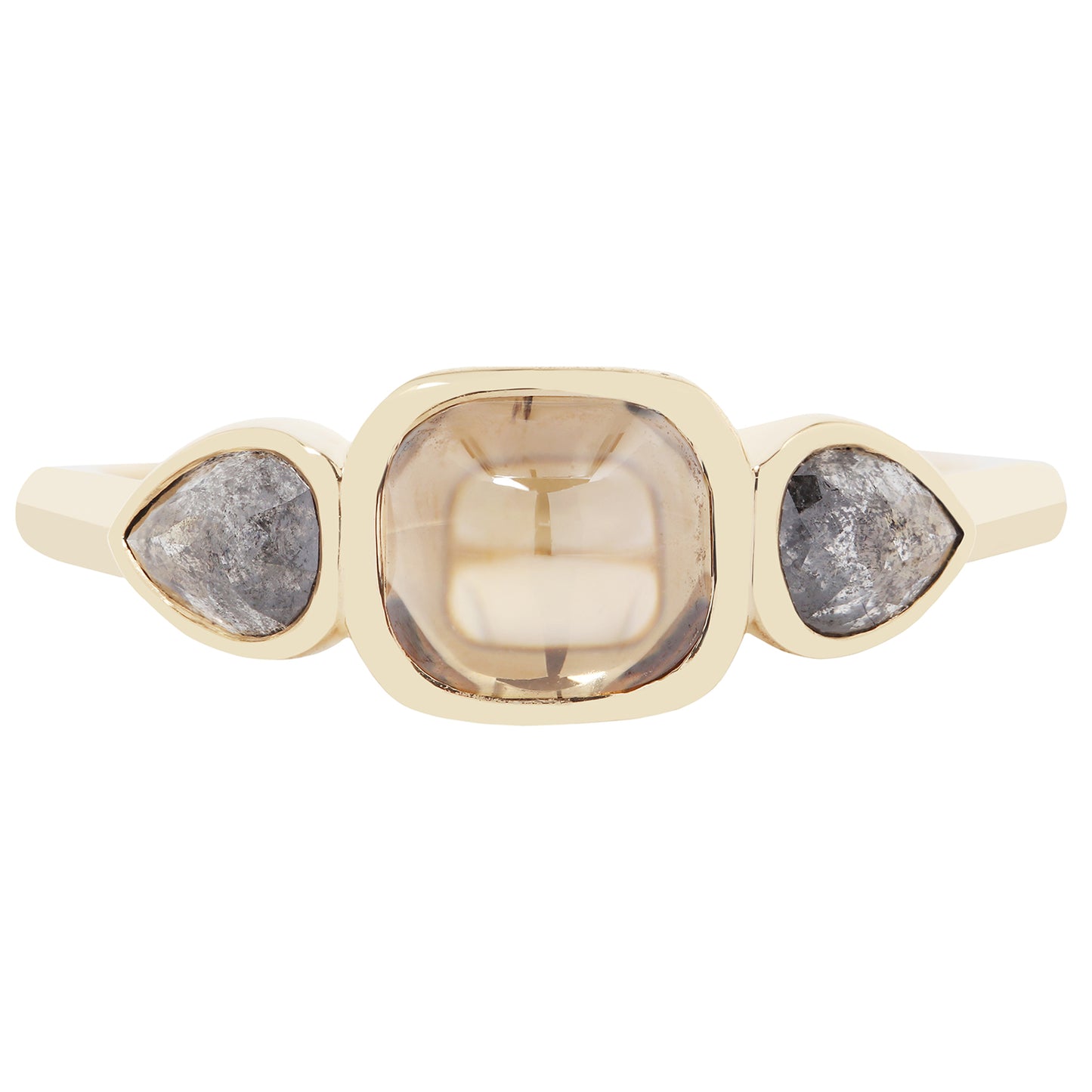 Gold ring with three stones on a white background
