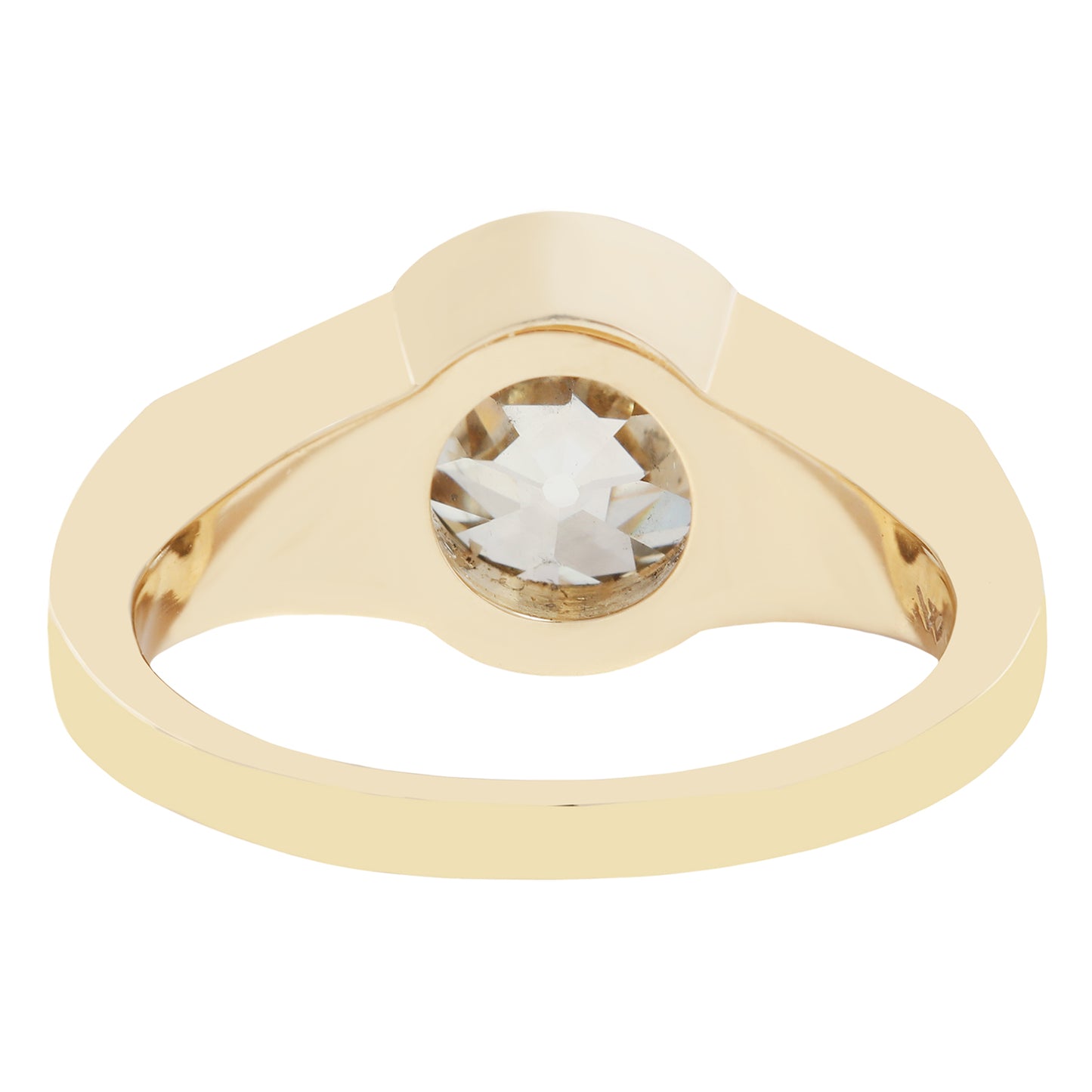 Gold ring with a large diamond on a white background