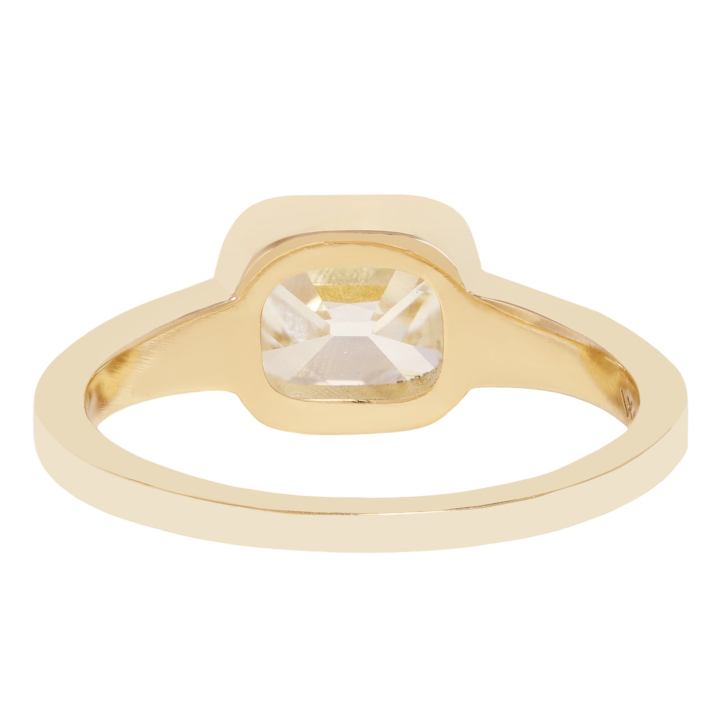 A gold ring with a square bezel-set clear diamond 