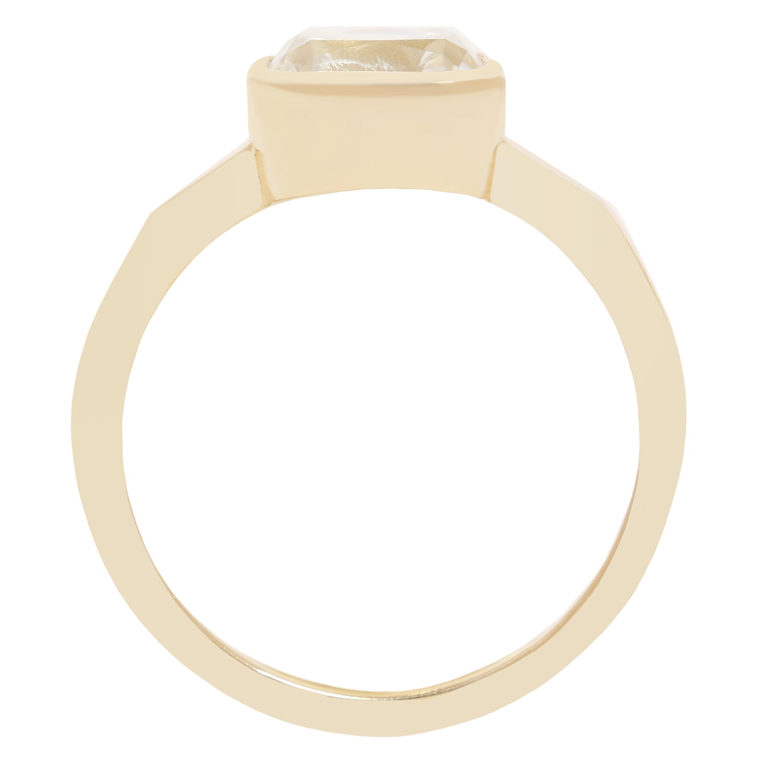 A gold ring with a square bezel-set clear diamond 