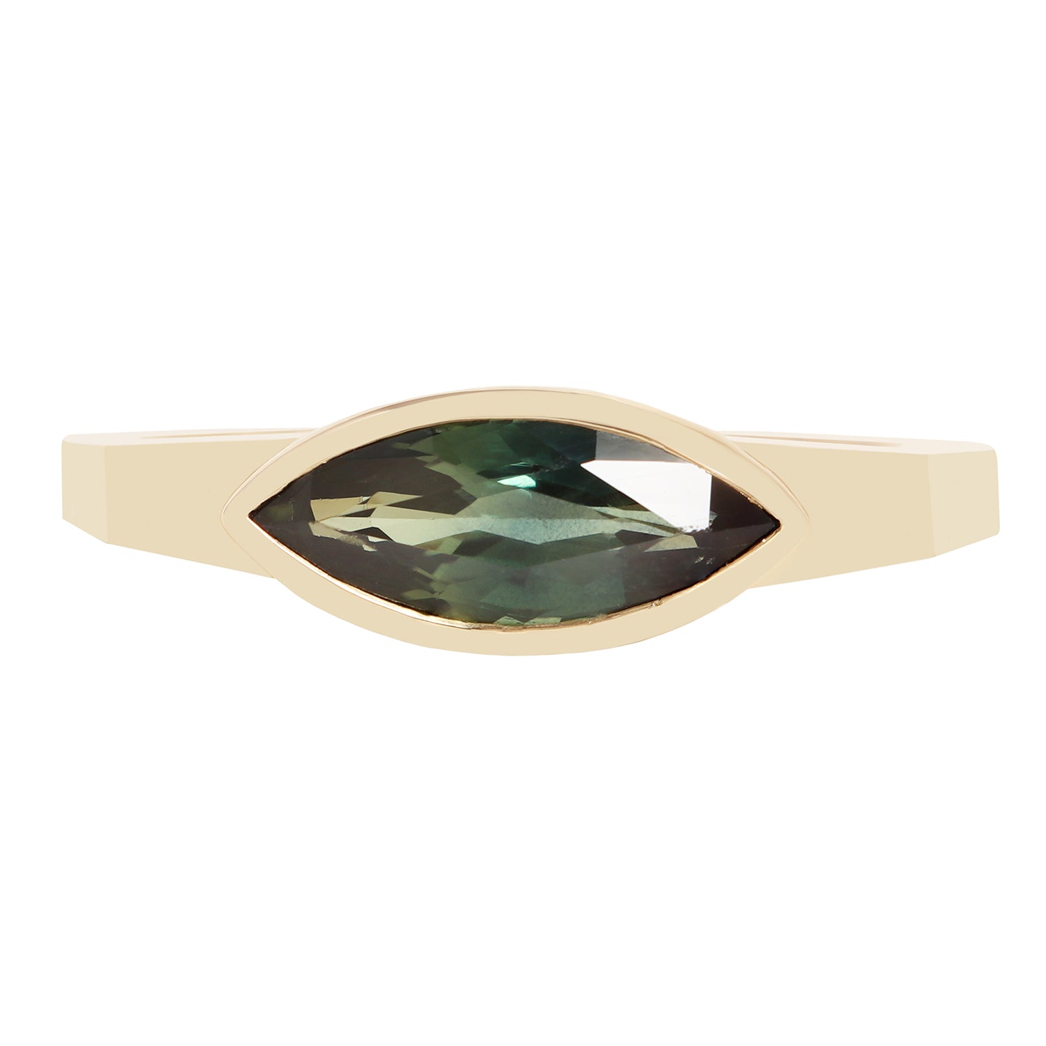 A gold ring featuring a marquise-cut green gemstone in a bezel setting, shown against a plain white background.