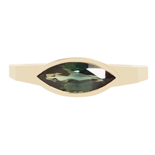A gold ring featuring a marquise-cut green gemstone in a bezel setting, shown against a plain white background.