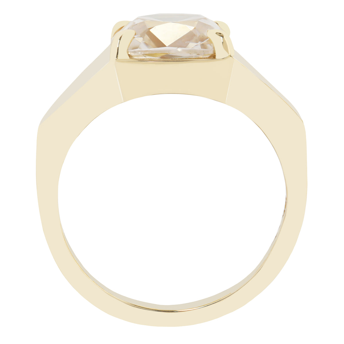 A yellow gold ring with a large, faceted clear gemstone in a square bezel setting, shown from a top-down view on a plain white background.