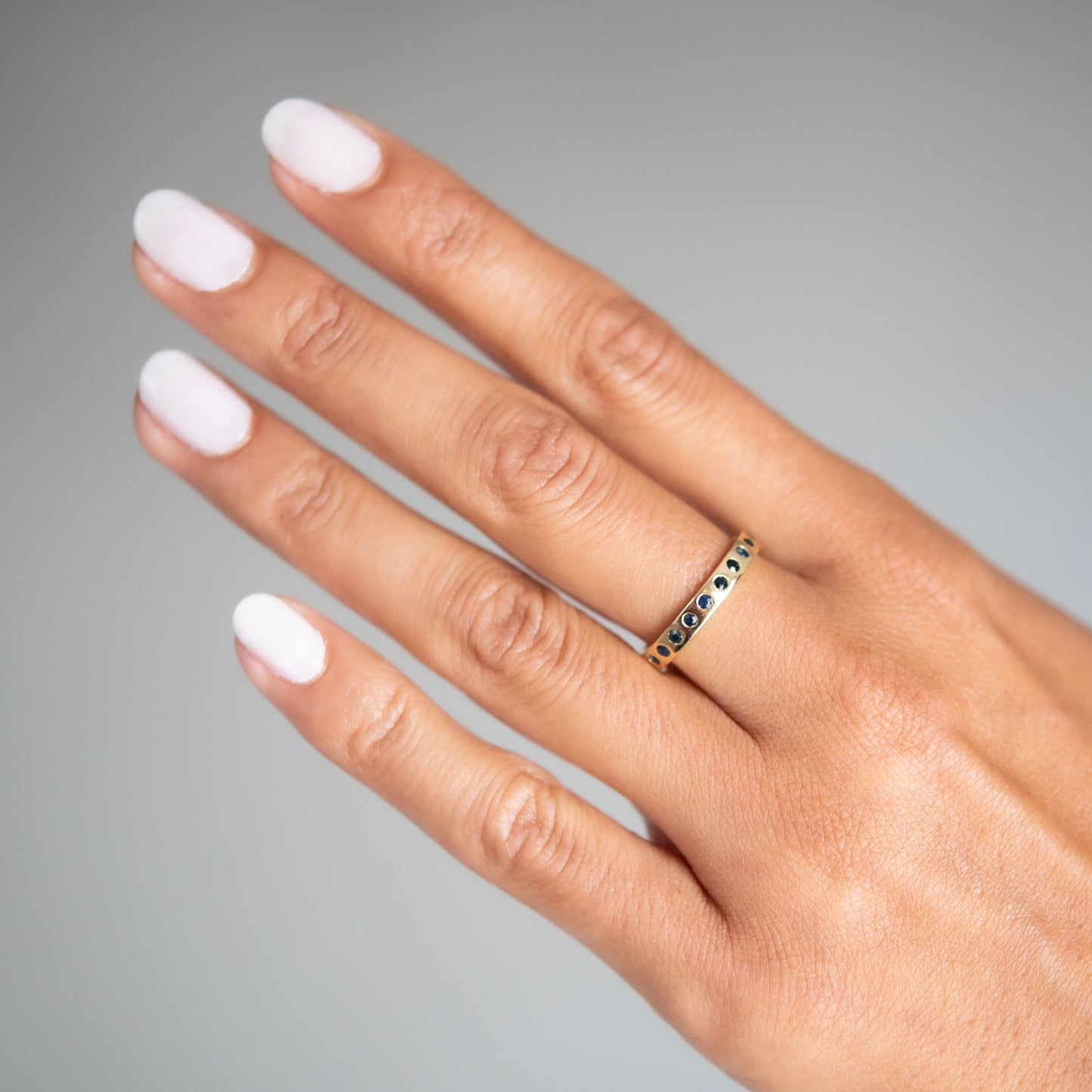 Dark Blue Sapphire Eternity Band