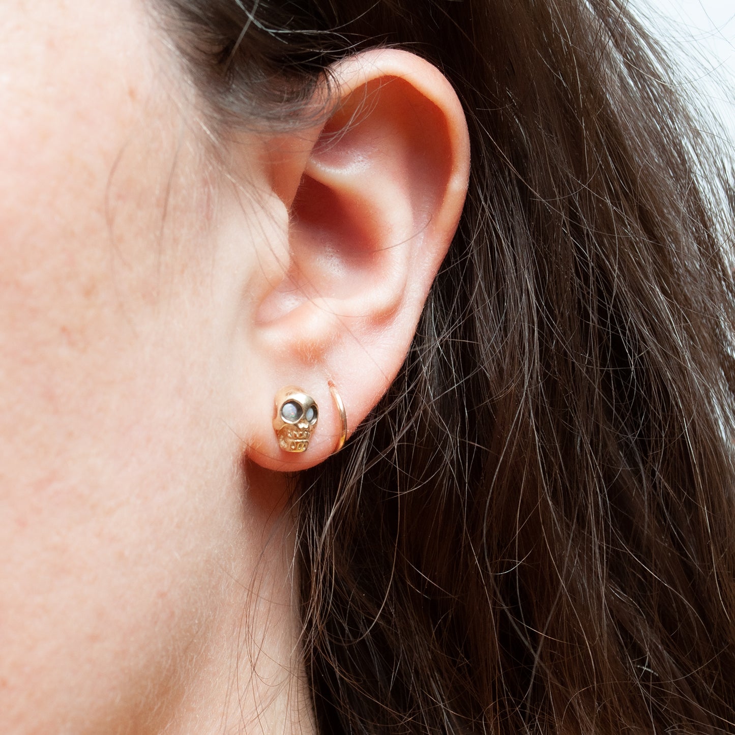 Opal Eyed Gold Skull Studs