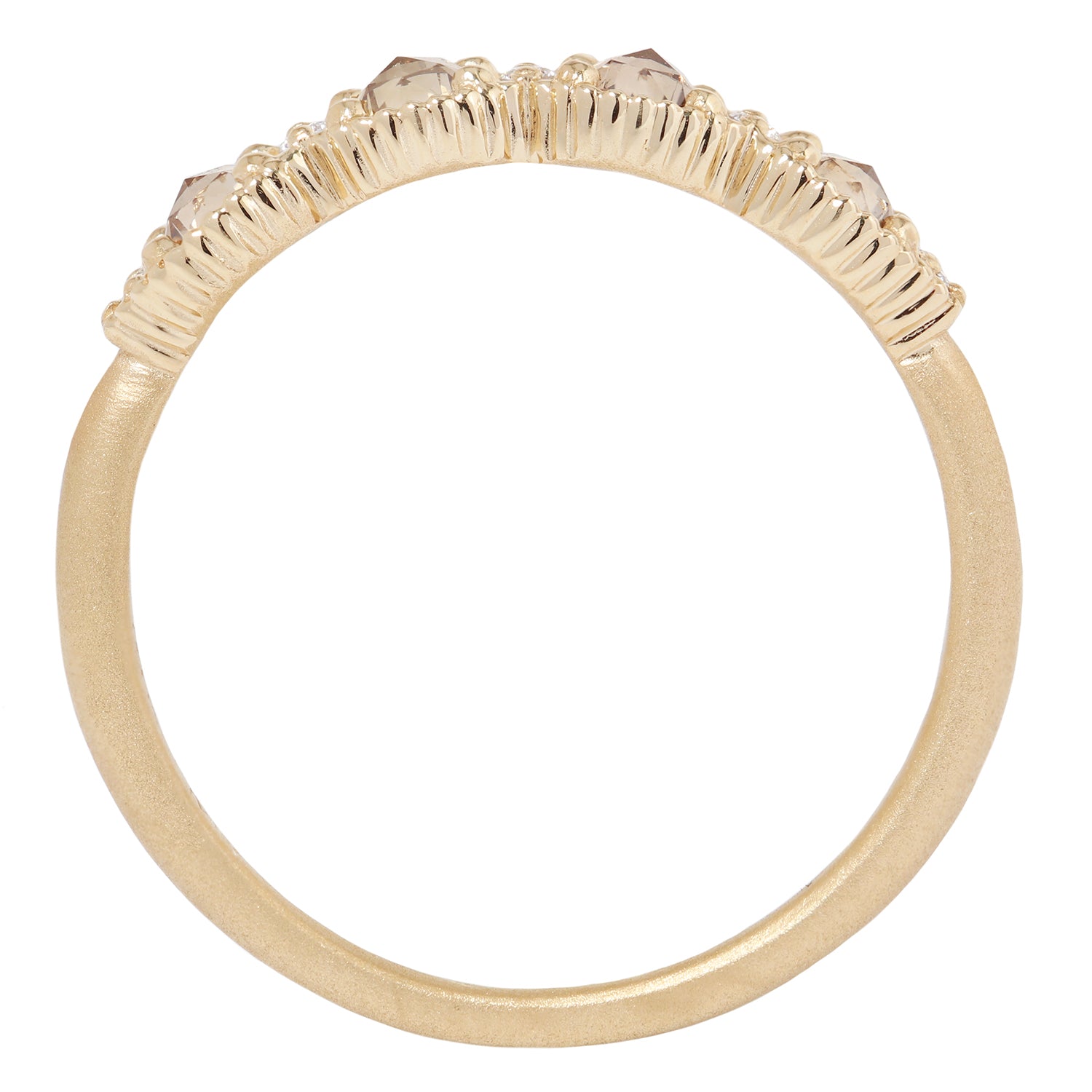 Gold ring with diamond stones on a white background