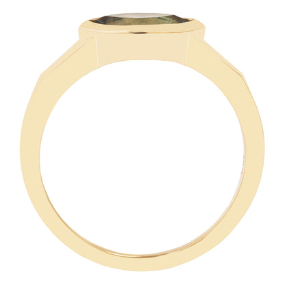 Lauren Wolf - Gold ring with a green gemstone on a white background