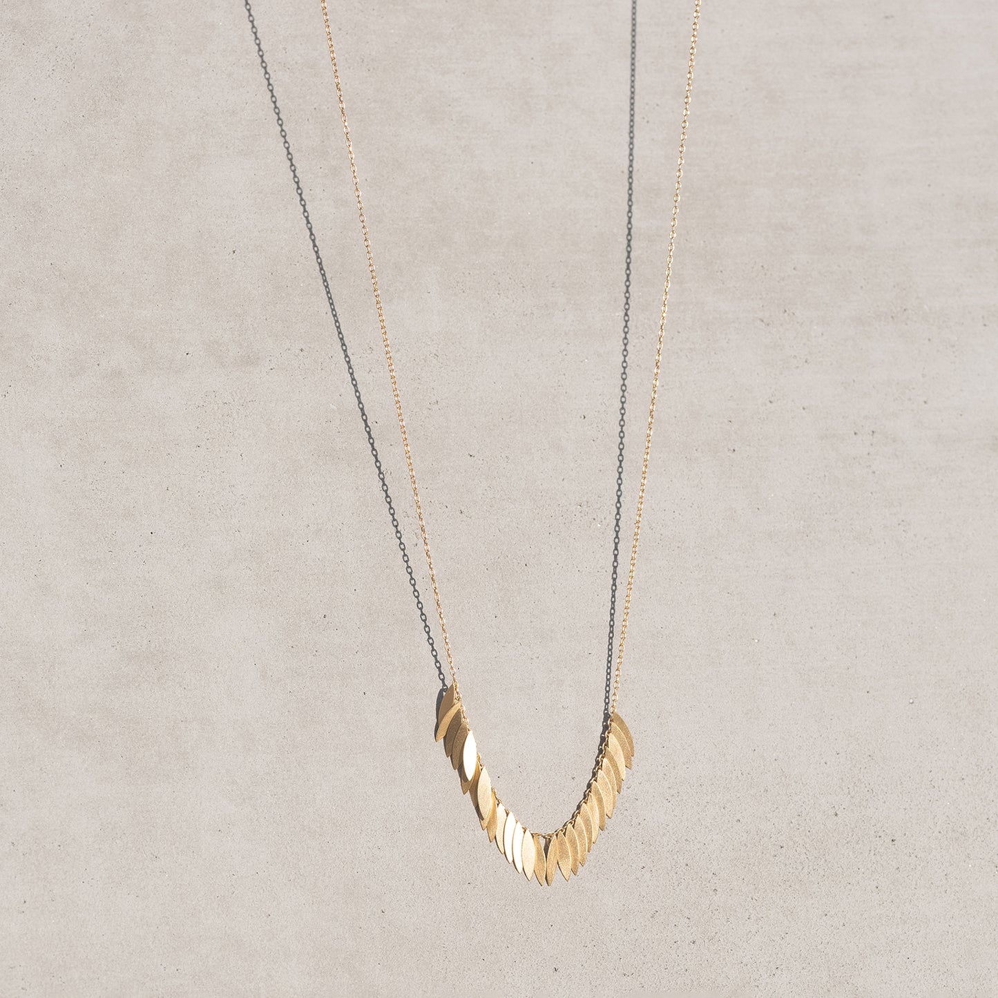 Golden Leaf Arc Necklace