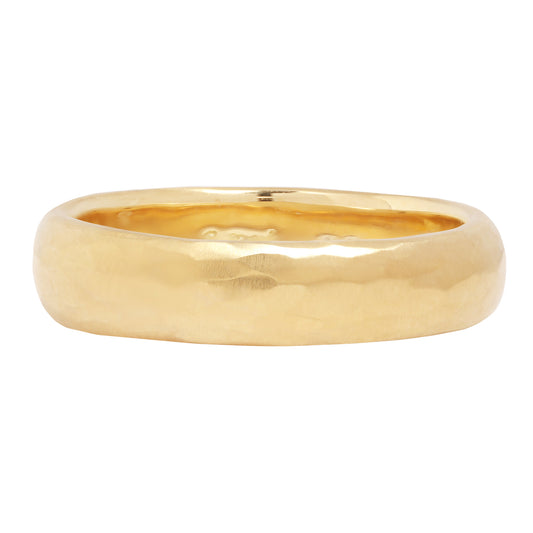 Satomi Kawakita - Gold ring on a white background