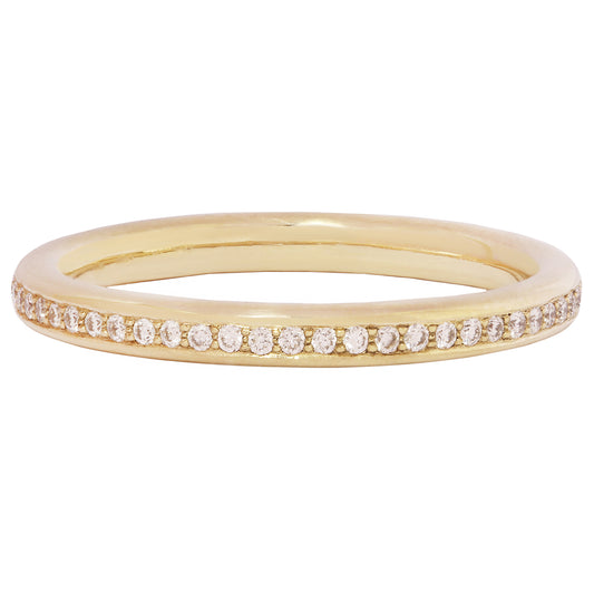 Gold ring with small diamonds on a white background
