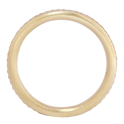 Gold ring on a white background