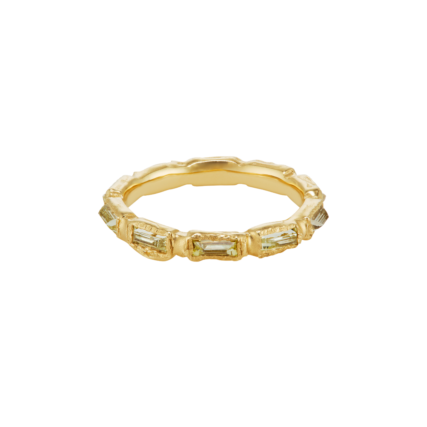 A yellow gold eternity ring featuring baguette-cut clear stones set along the band, shown against a plain white background.