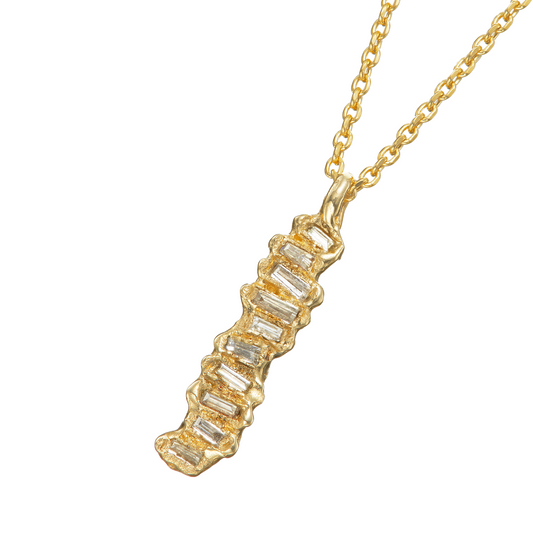 Ellis Mhairi Cameron - Gold necklace with a unique pendant on a white background