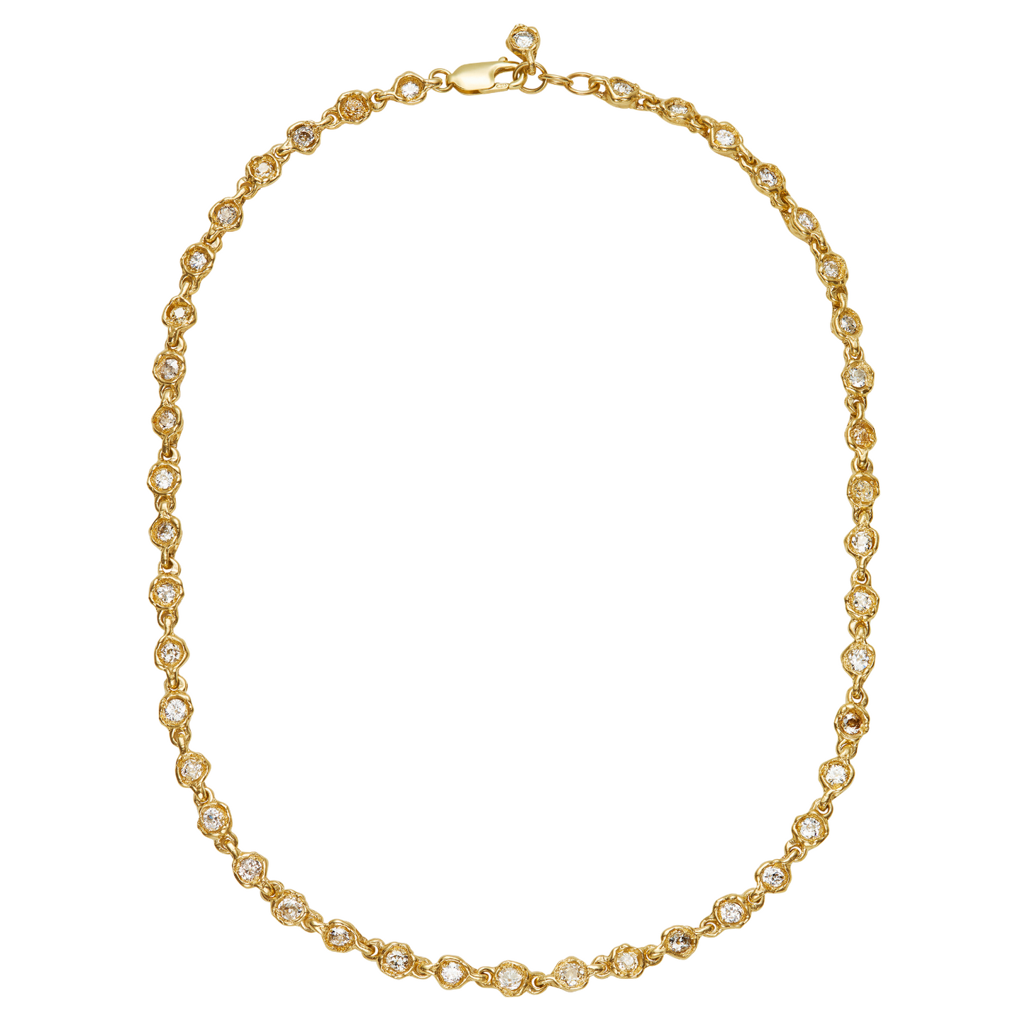 A gold tennis necklace with small clear gemstones set in each link, arranged in an oval shape on a plain white background.