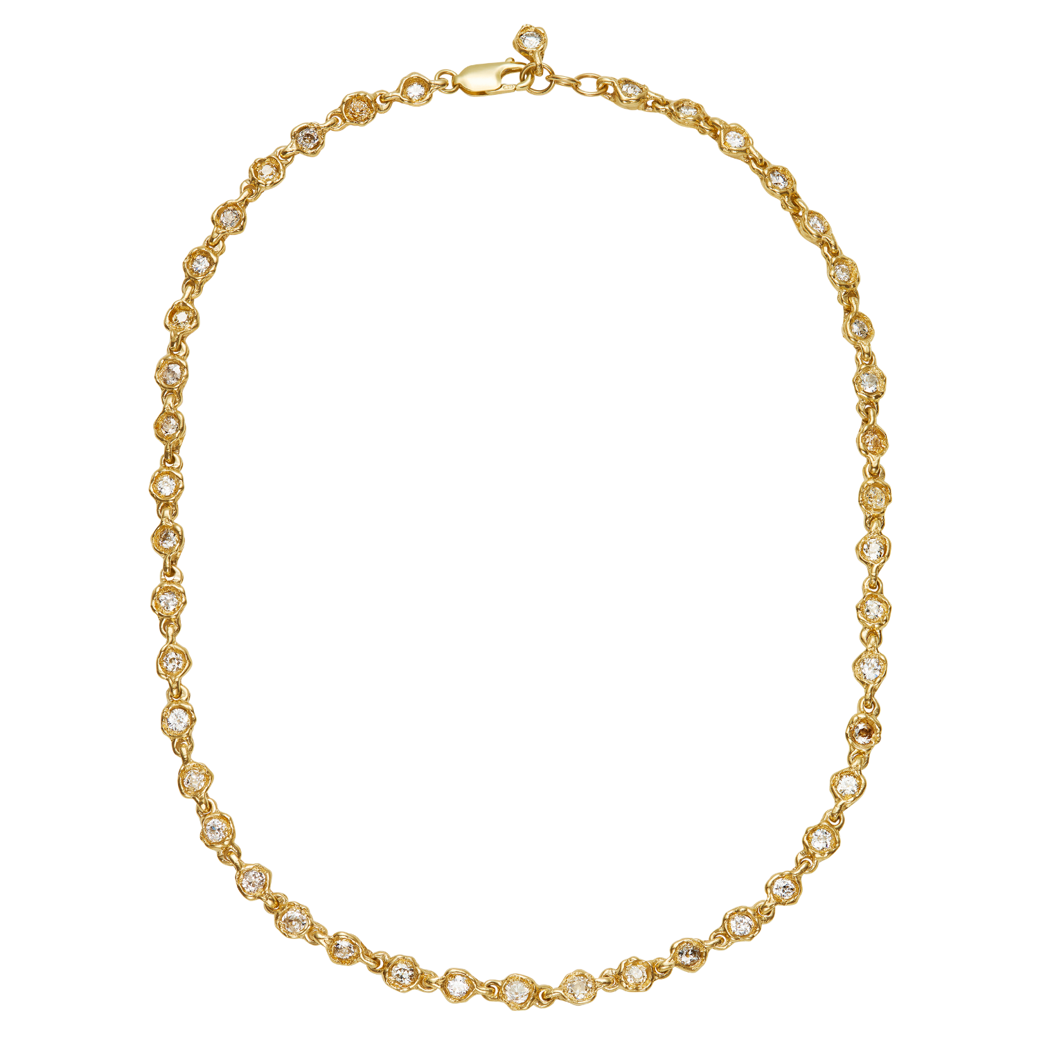 A gold tennis necklace with small clear gemstones set in each link, arranged in an oval shape on a plain white background.