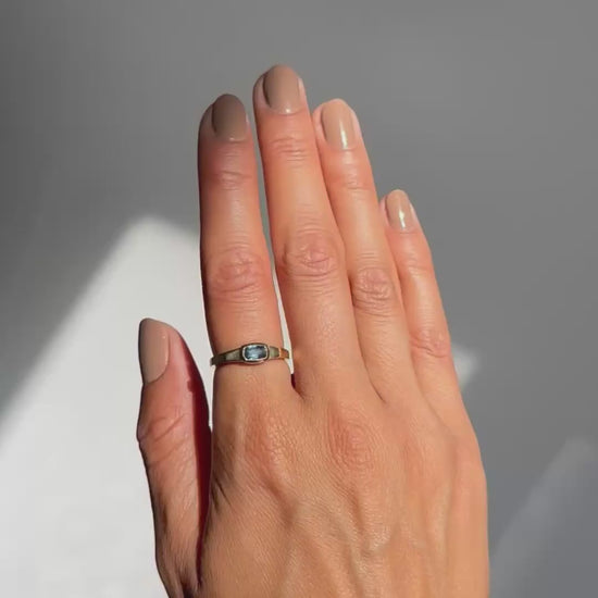 Lauren Wolf - blue sapphire ring on hand
