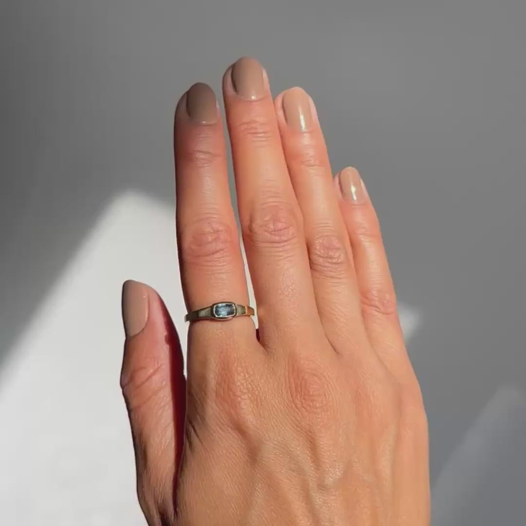 Lauren Wolf - blue sapphire ring on hand