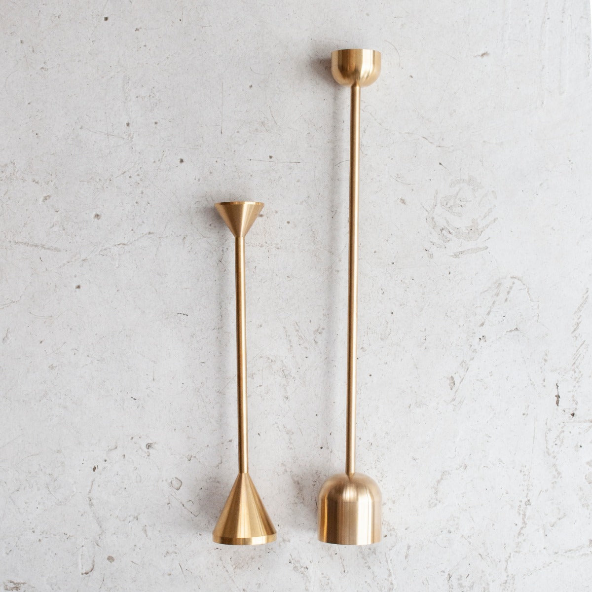 Fort Standard's tall brass candlestick with dome shaped base